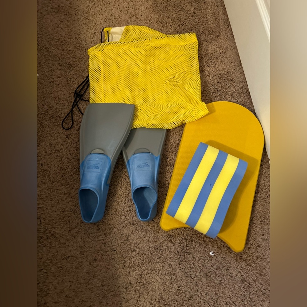 Kickboard, flippers, andpull buoy